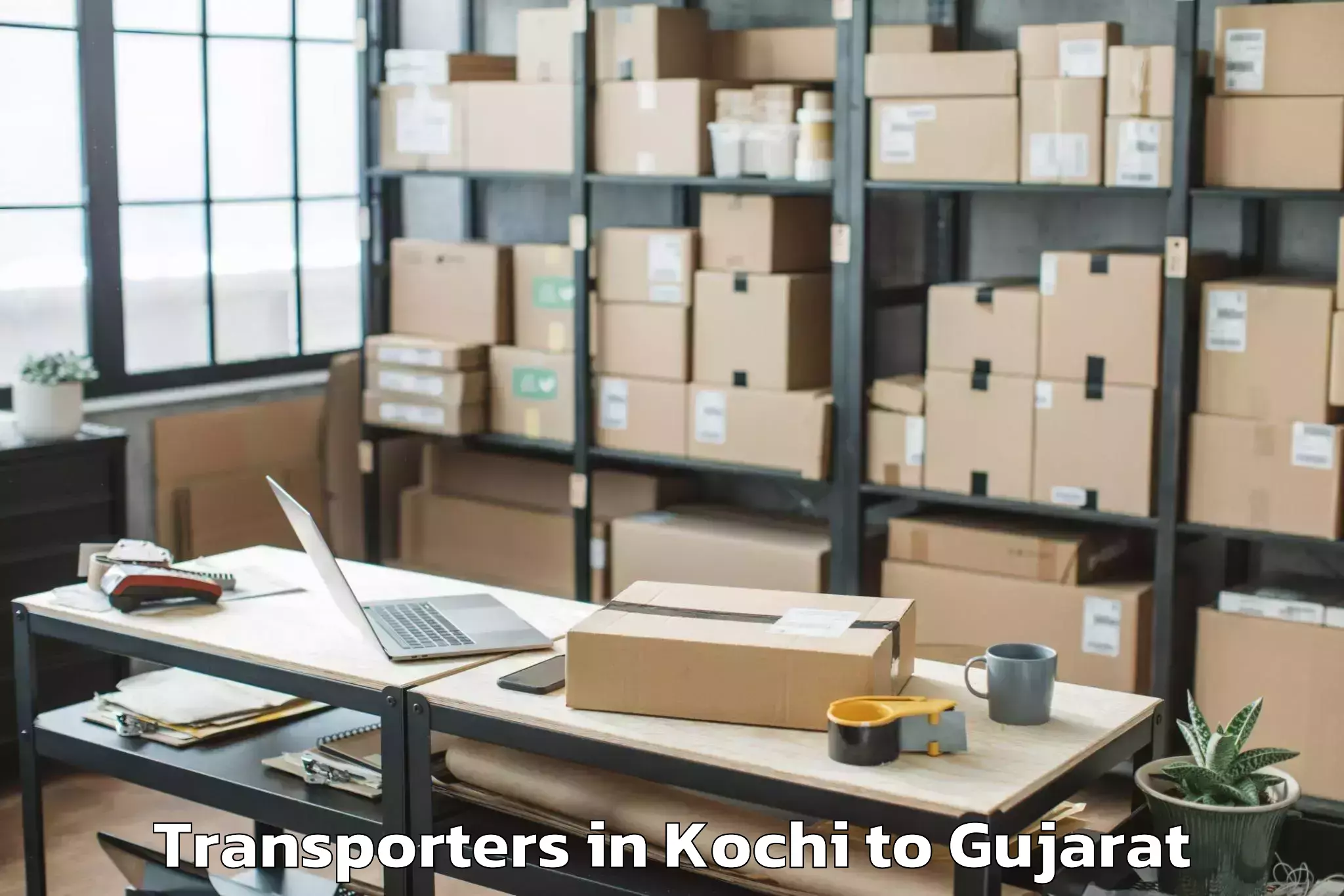 Top Kochi to Dhuwaran Transporters Available